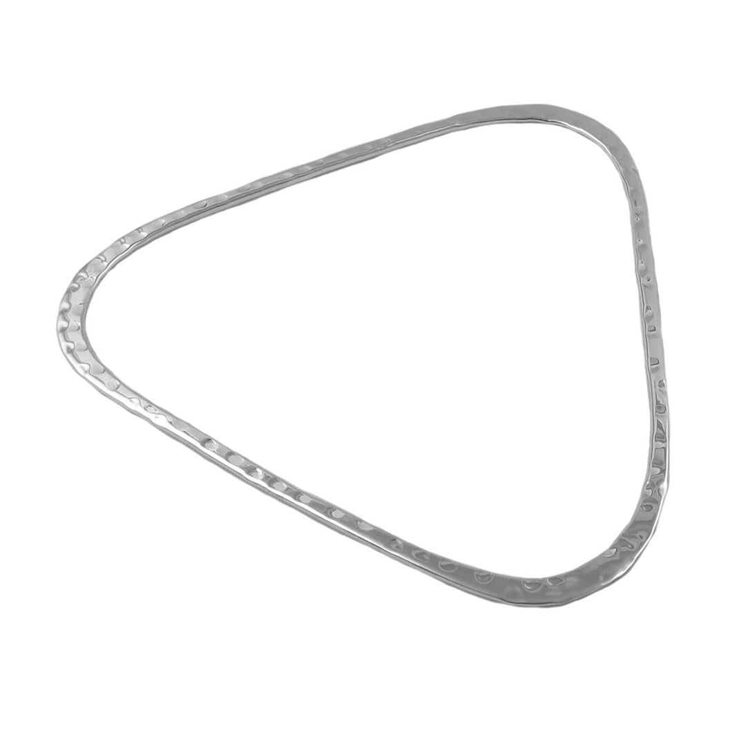 Silver bangle in the shape of  triangle wiht a textured hammered finish on a white background