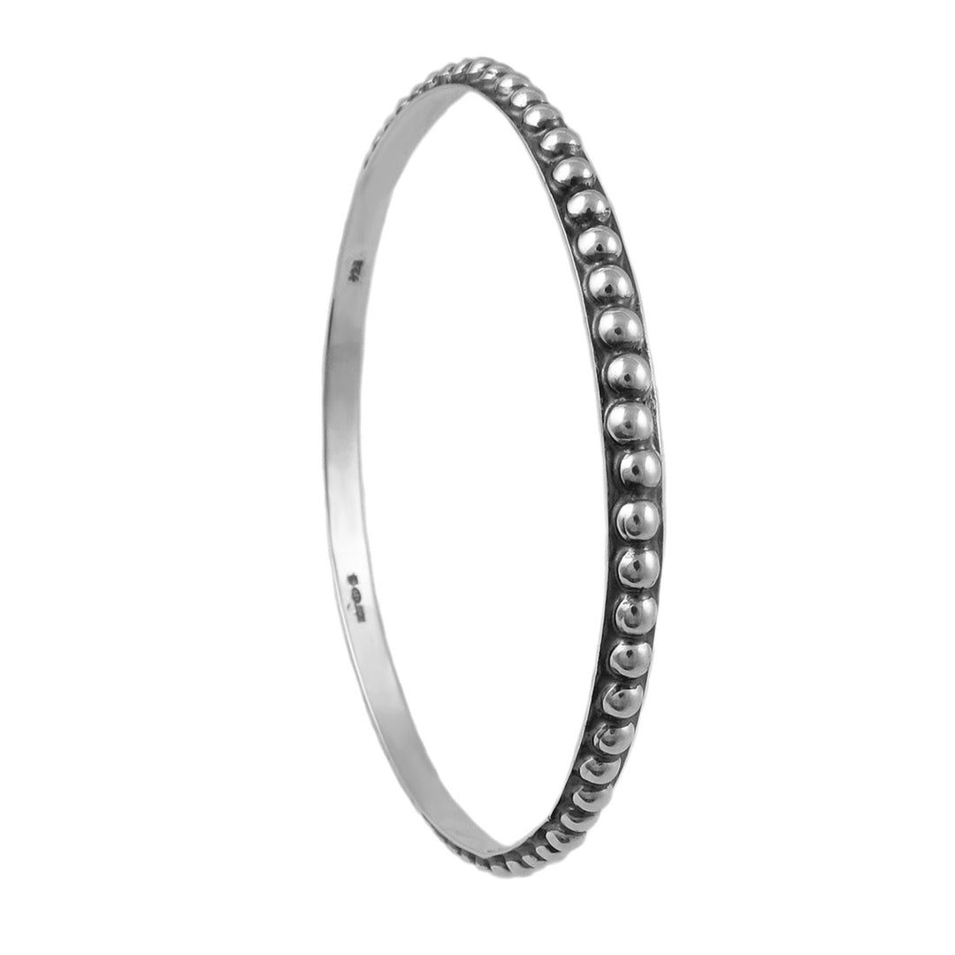 UK hallmarked 925 sterling silver with beaded detailing on a white background