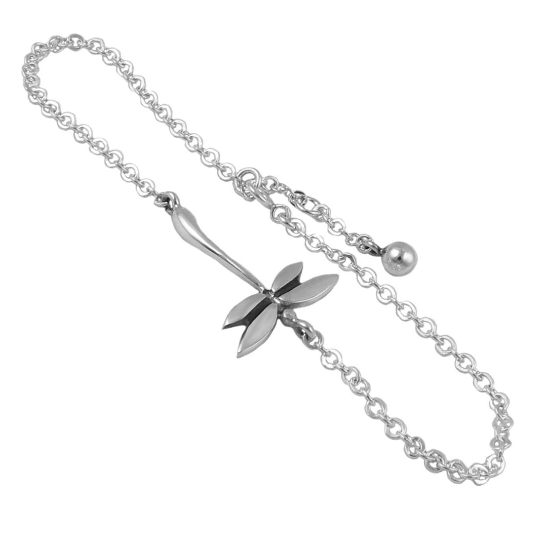Silver chain bracelet with a dragonfly link on a white background