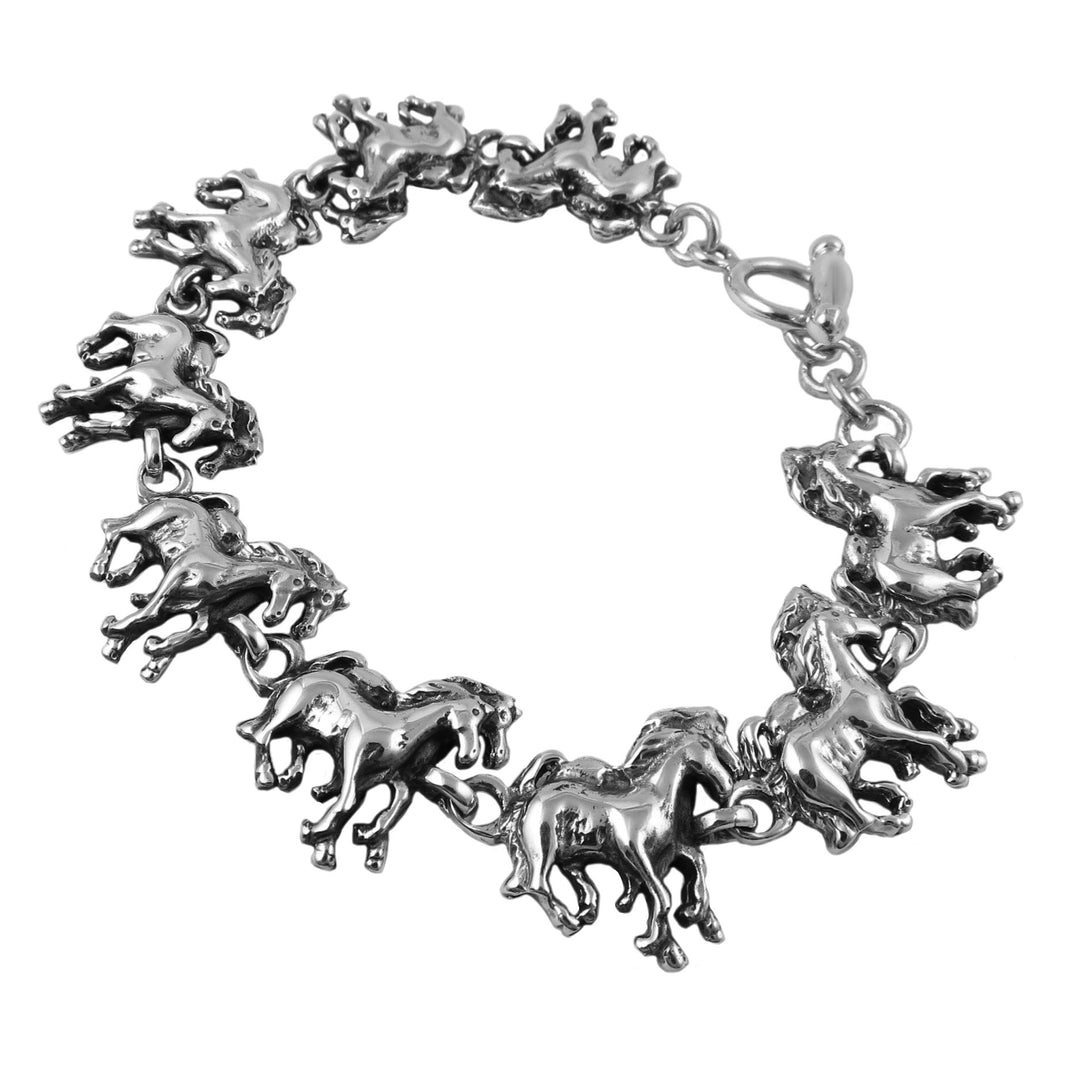 Silver bracelet with horse-shaped links on a white background