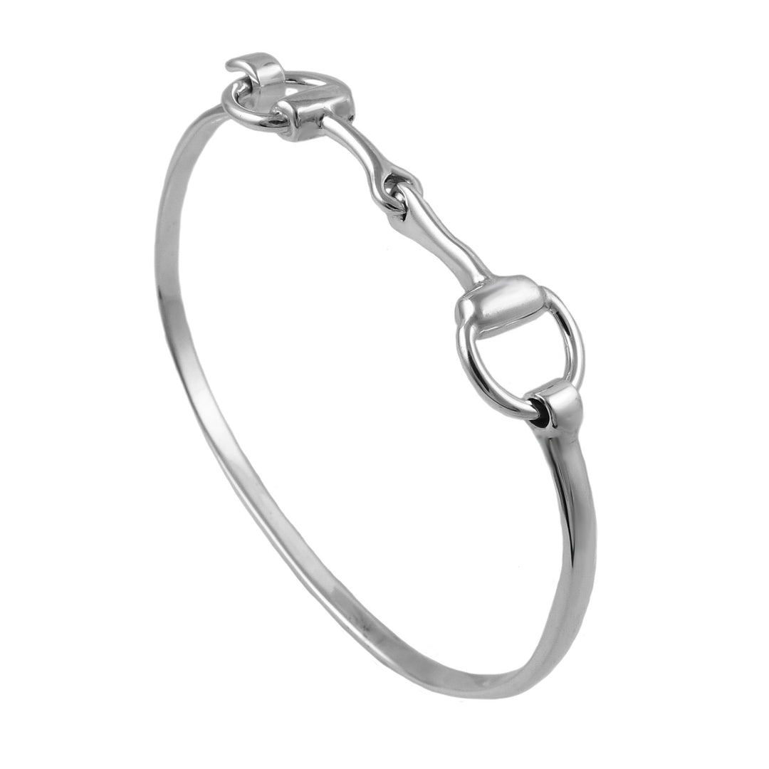 Silver horse bit bracelet on a white background
