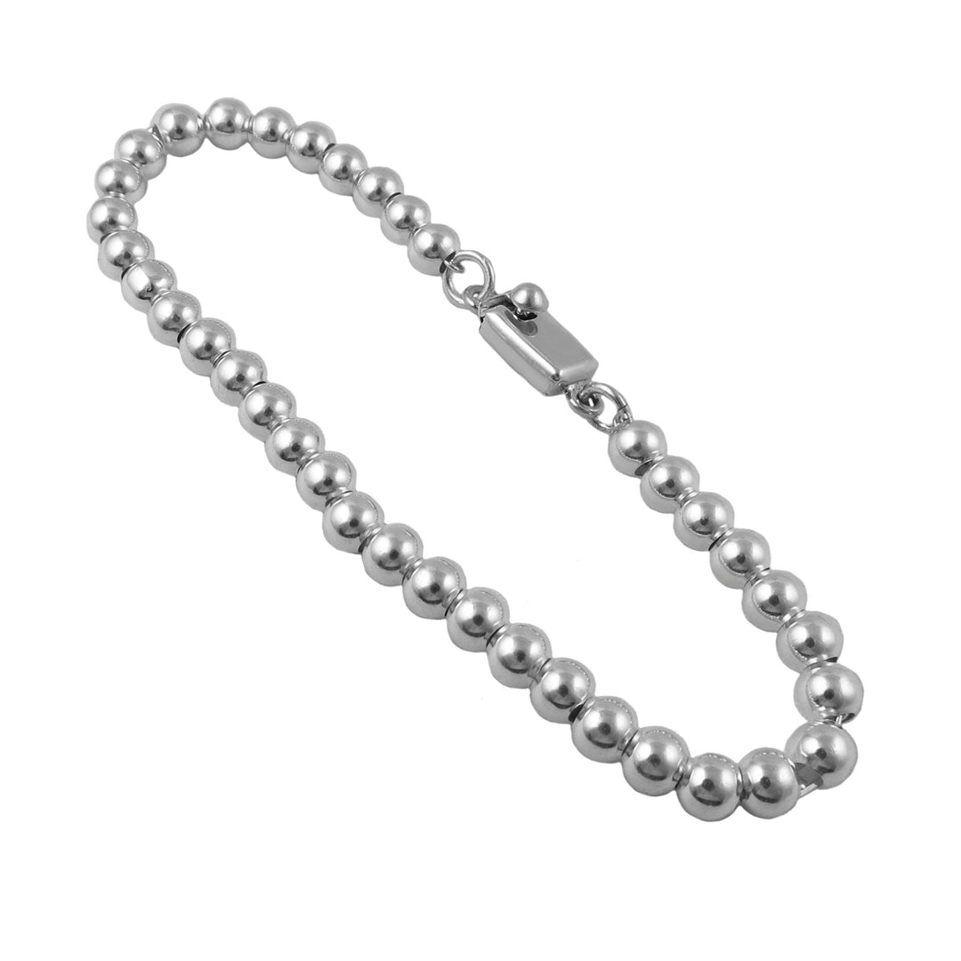 A classic UK hallmark 925 sterling silver ball beaded bracelet with a push box fastener on a white background. 