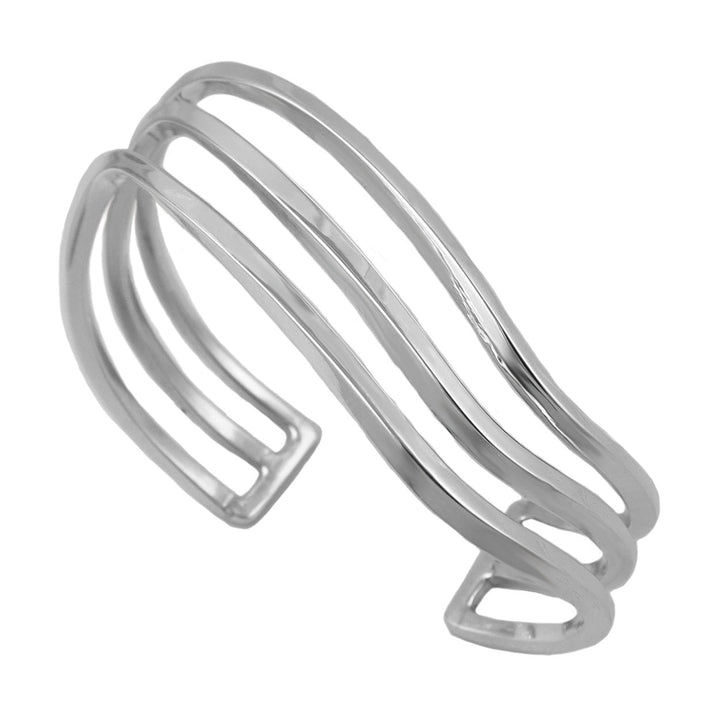 Handmade sterling silver cuff bracelet on a white background