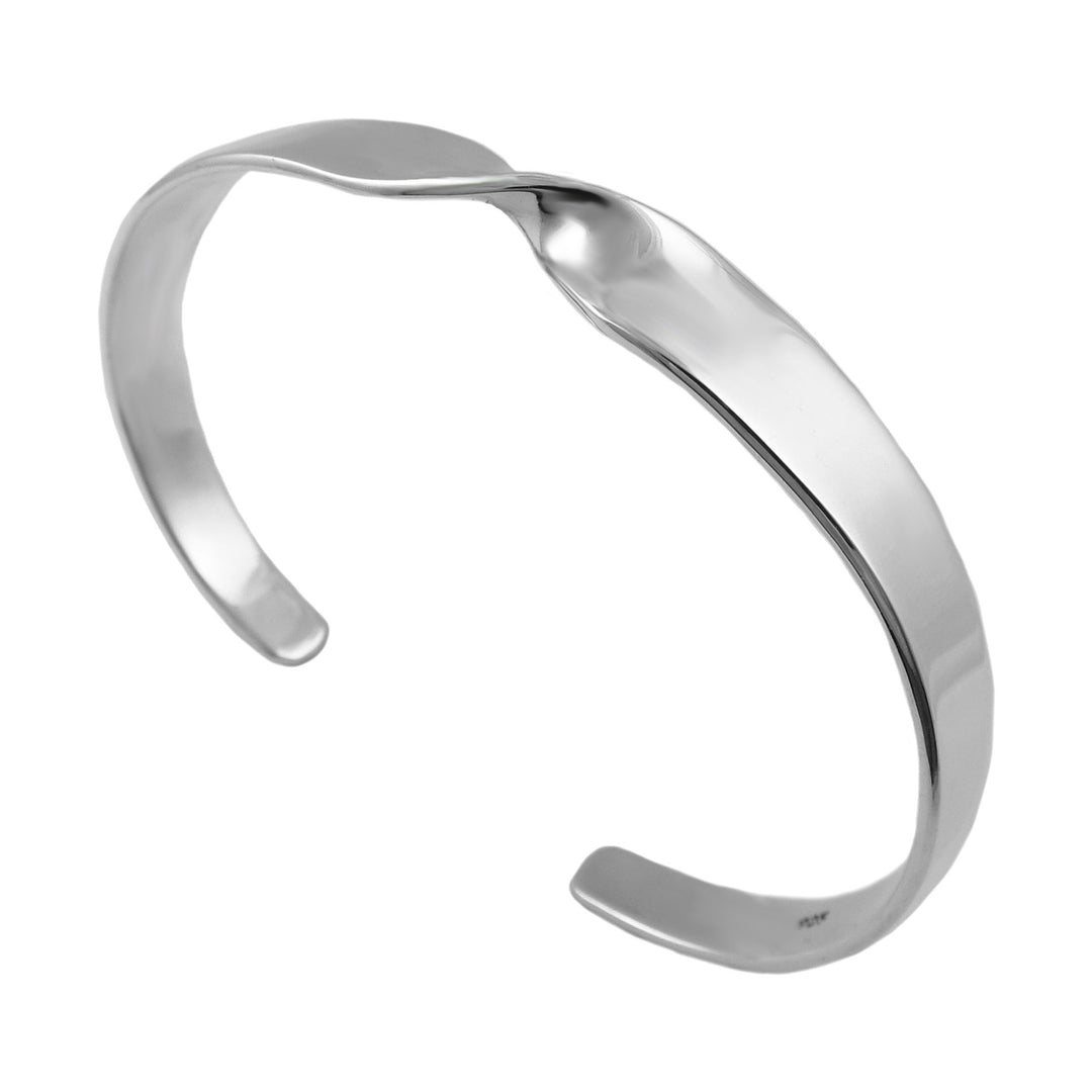 Large UK hallmarked 925 sterling silver bracelet with a twist detail at the front on a white background