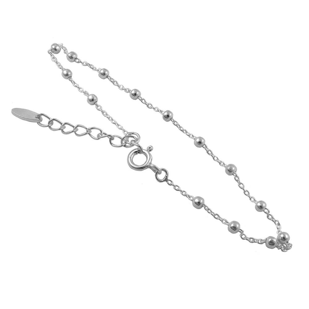 A 925 sterling silver bracelet with a chain and beaded design and an extension chain for adjusting the length against a white background
