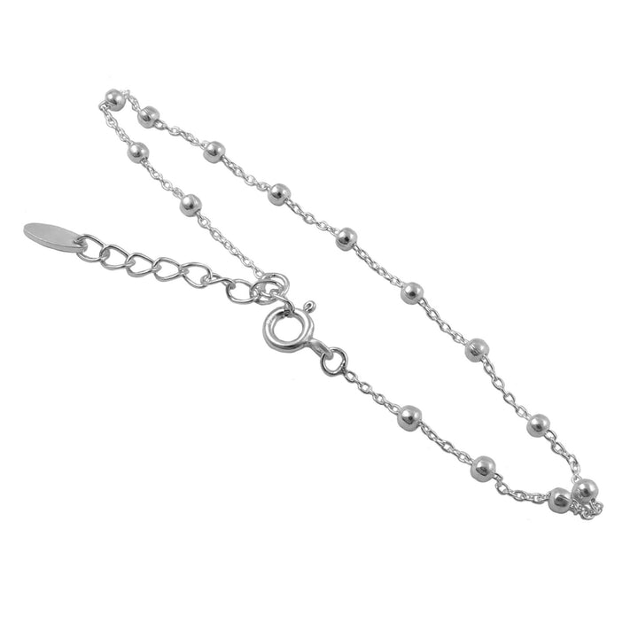 A 925 sterling silver bracelet with a chain and beaded design and an extension chain for adjusting the length against a white background