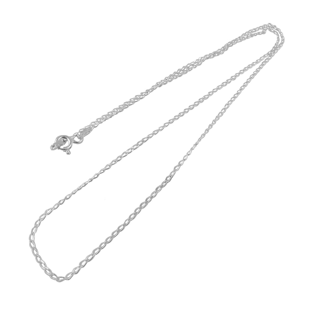 Silver curb chain necklace on a white background