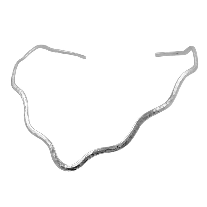 A UK hallmarked 925 sterling silver hammered choker necklace torque with an organic, wavy silhouette, shown on a plain white background.
