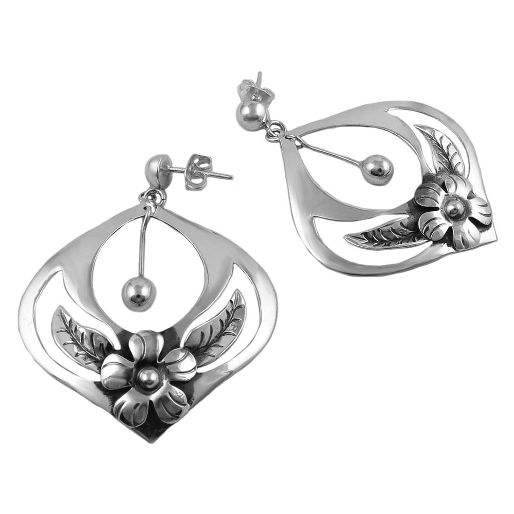 A pair of sterling 925 silver drop earrings with flowers and leaf accents and a single dangling ball bead.