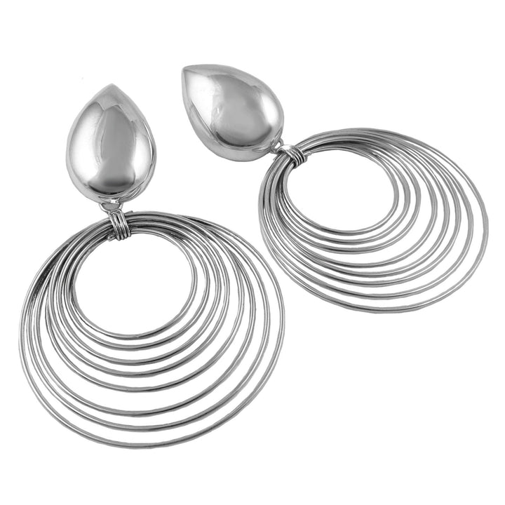 Large silver multi hoop earrings on a white background