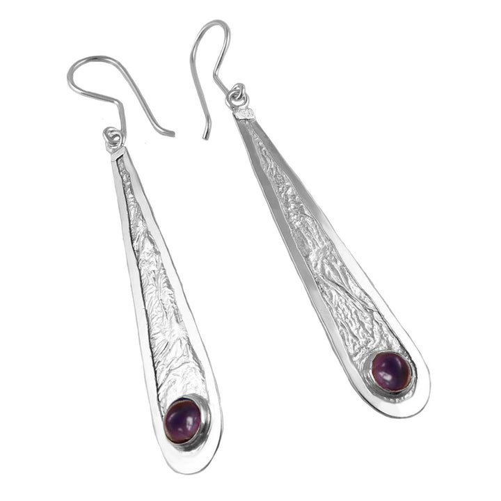 Crushed 925 Silver earrings for women with purple amethyst gemstones on a white background
