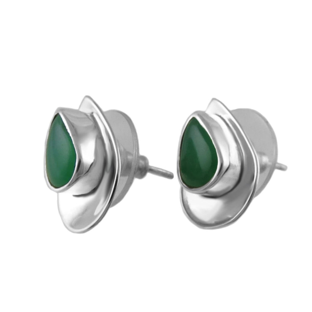 Silver earrings with green gemstones on a white background