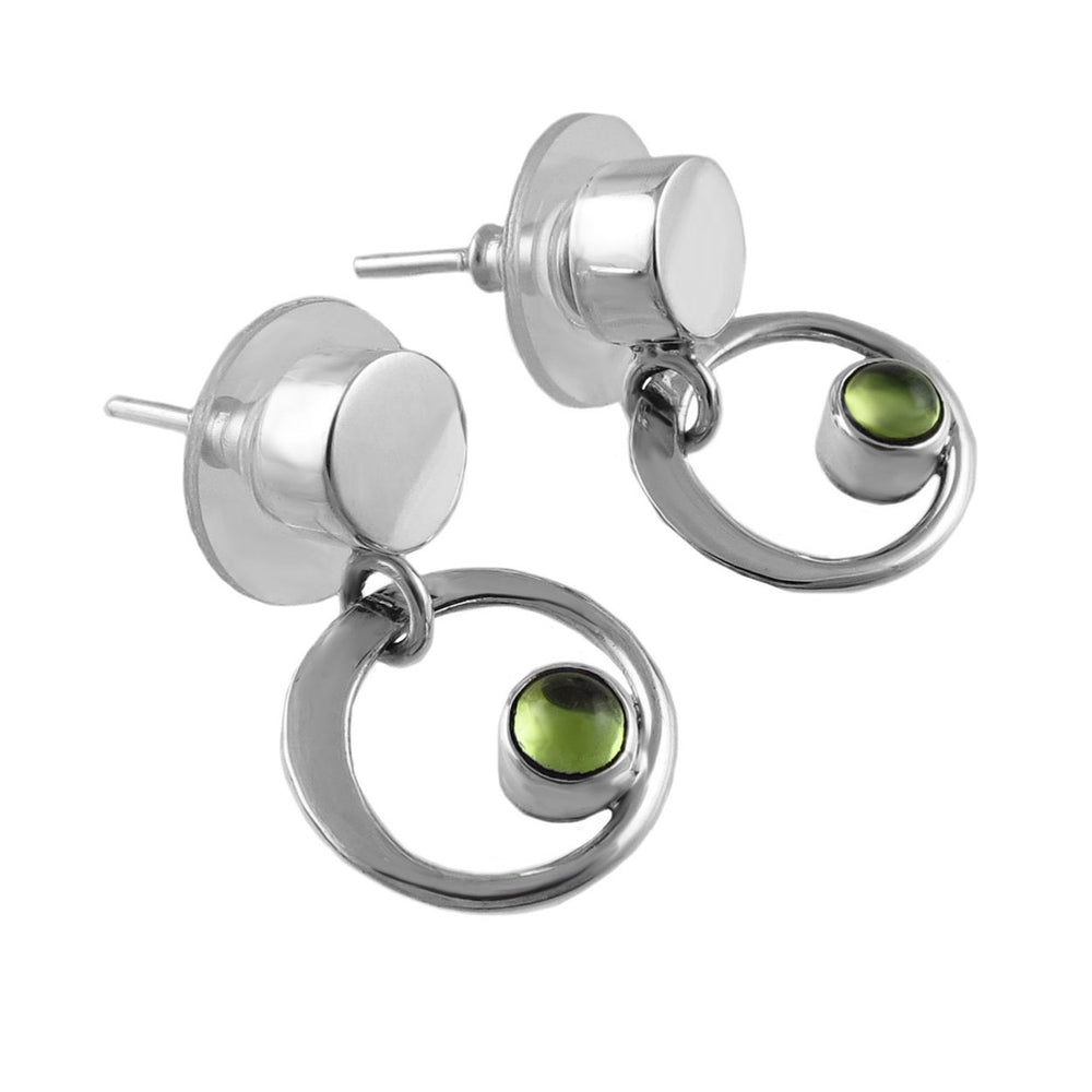 Silver earrings with green peridot gemstones on a white background