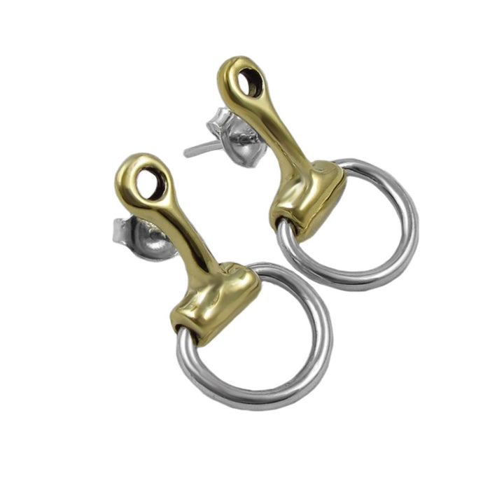 Pair of gold and silver equestrian bit earrings on a white background