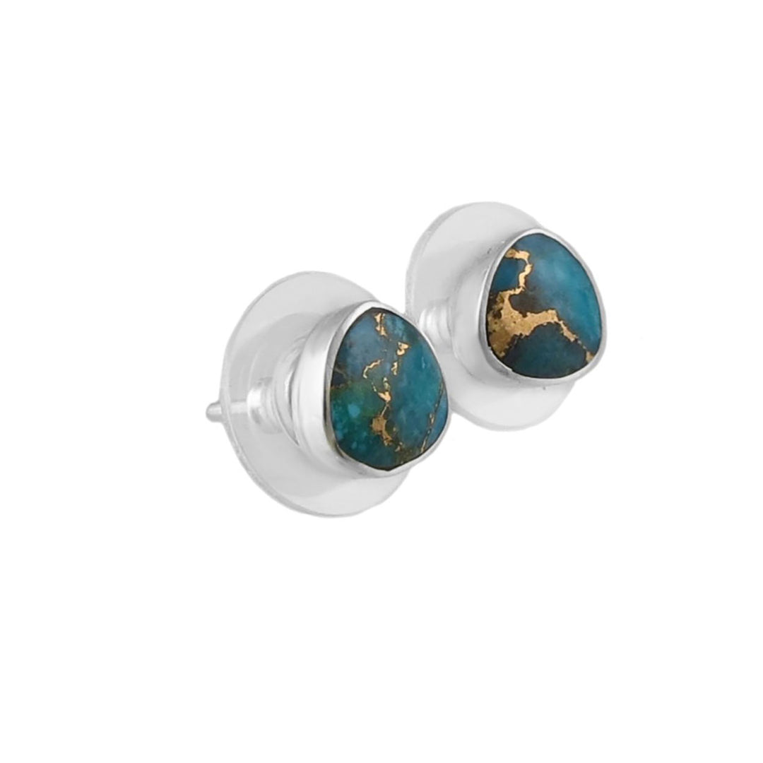 Pair of earrings with turquoise stones and gold accents on a white background