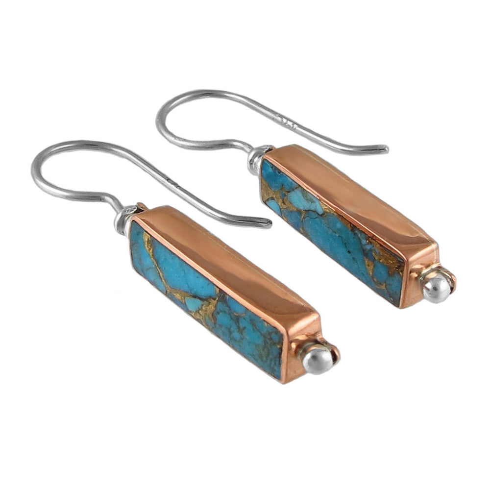 Large rectangle mixed metal drop earrings for women in 925 silver and copper with turquoise stones on a white background. 