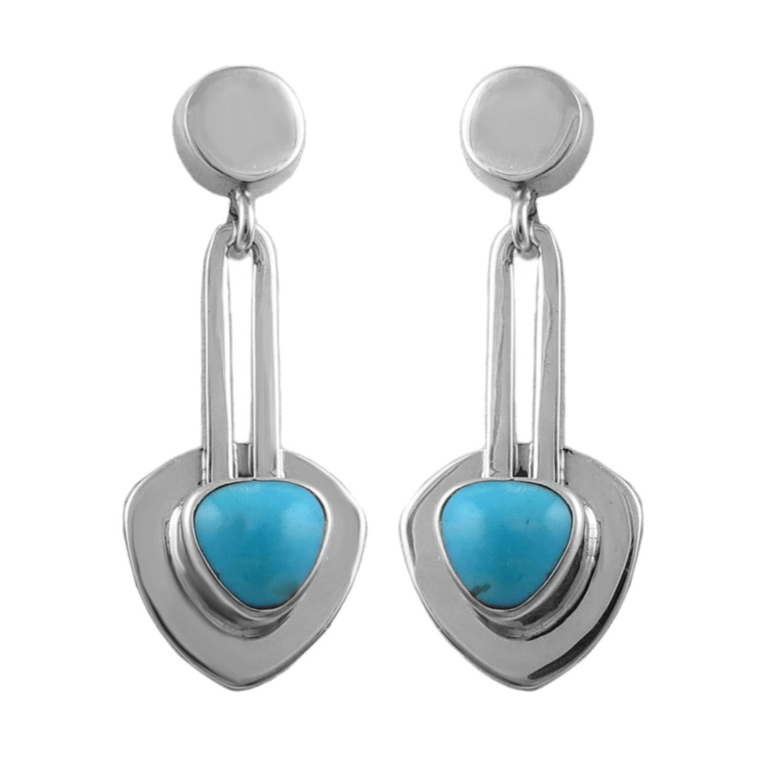 Silver earrings with natural turquoise gemstones stones on a white background