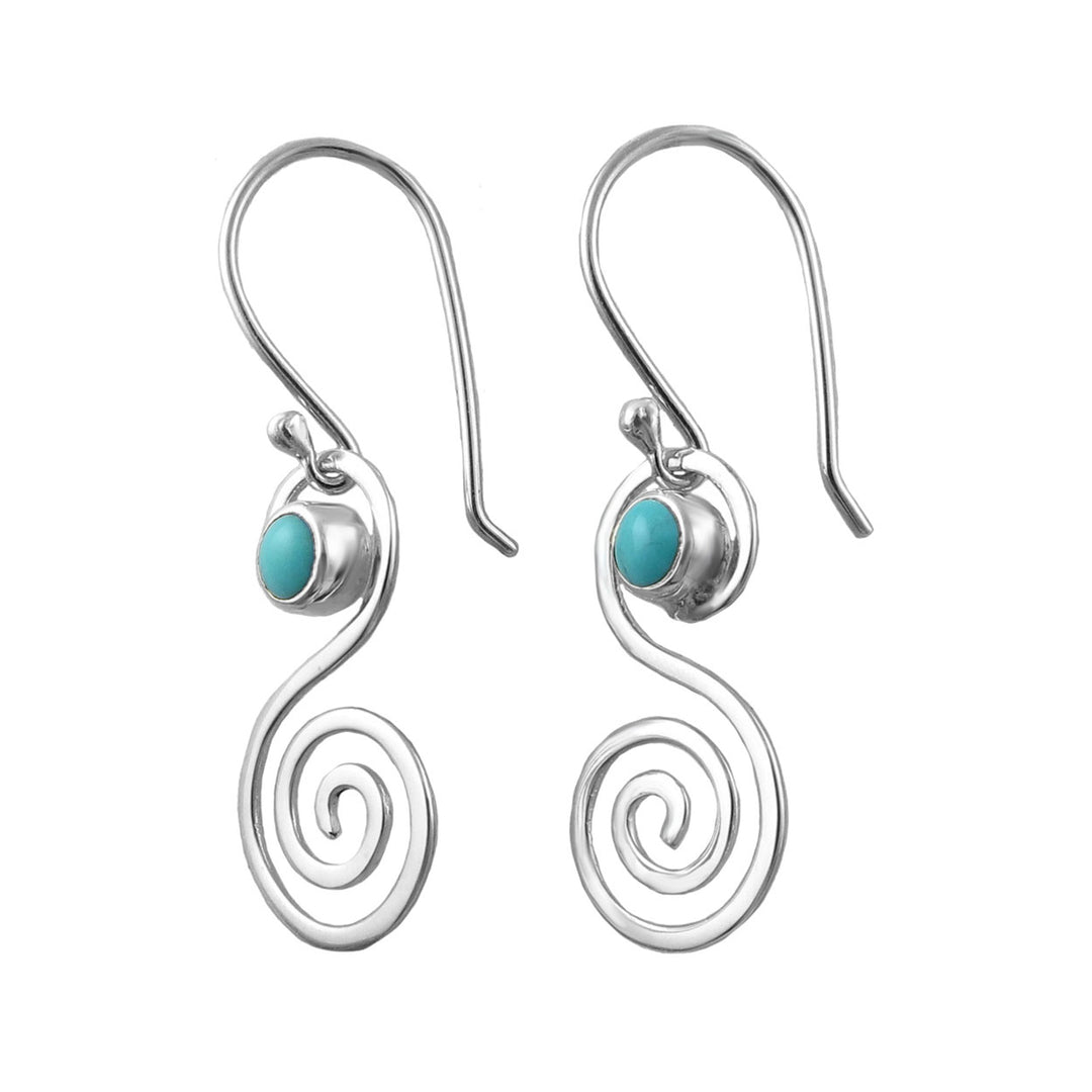 Sterling silver spiral drop earrings with turquoise gemstones on a white background. 