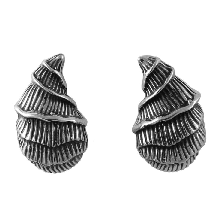 A large pair of unusual seashell earrings in polished and antiqued 925 sterling silver on a white background