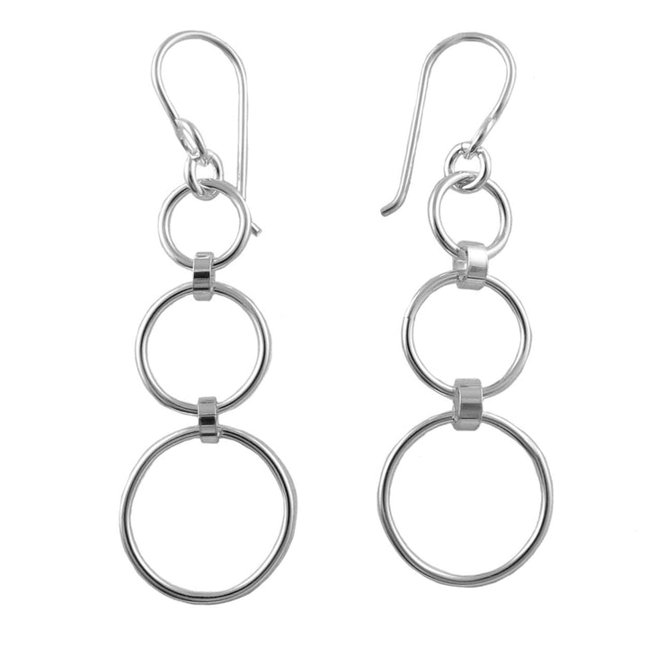 Pair of long 925 silver triple hoop earrings on a white background