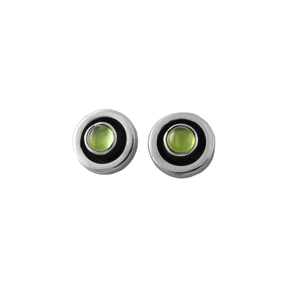 Pair of round earrings with green natural peridot gemstones on a white background