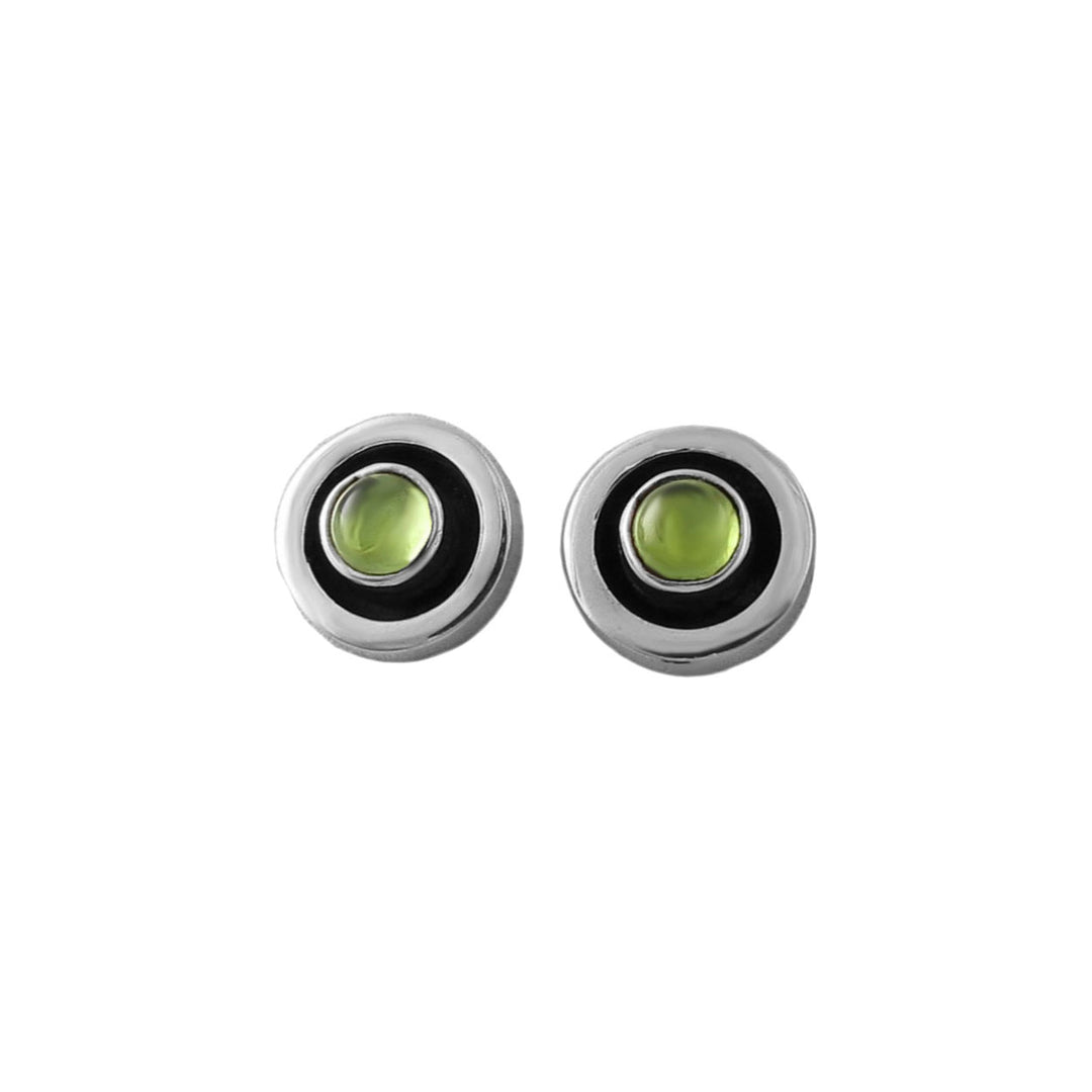 Pair of round earrings with green natural peridot gemstones on a white background