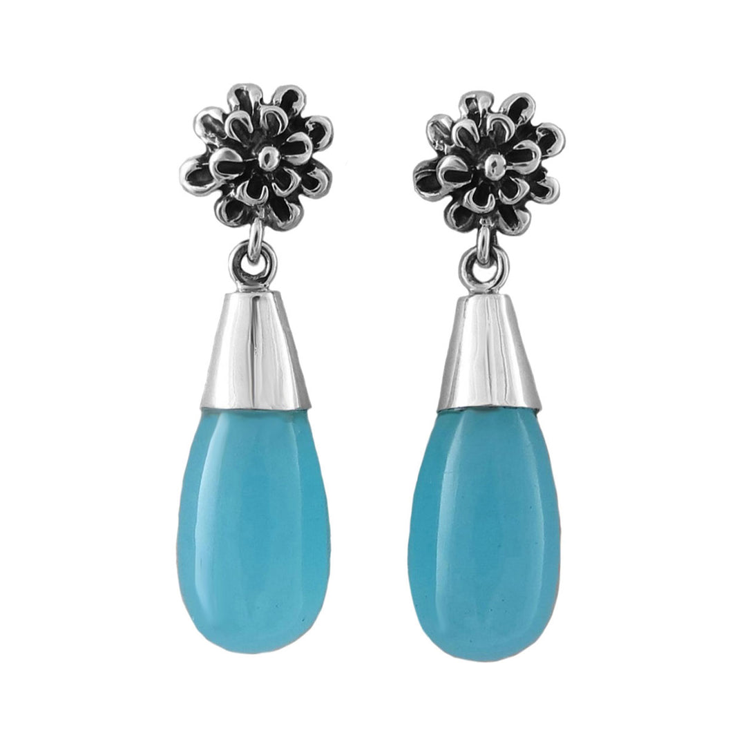 Pair of sterling 925 silver earrings with floral tops and blue chalcedony stones teardrop shapes on a white background