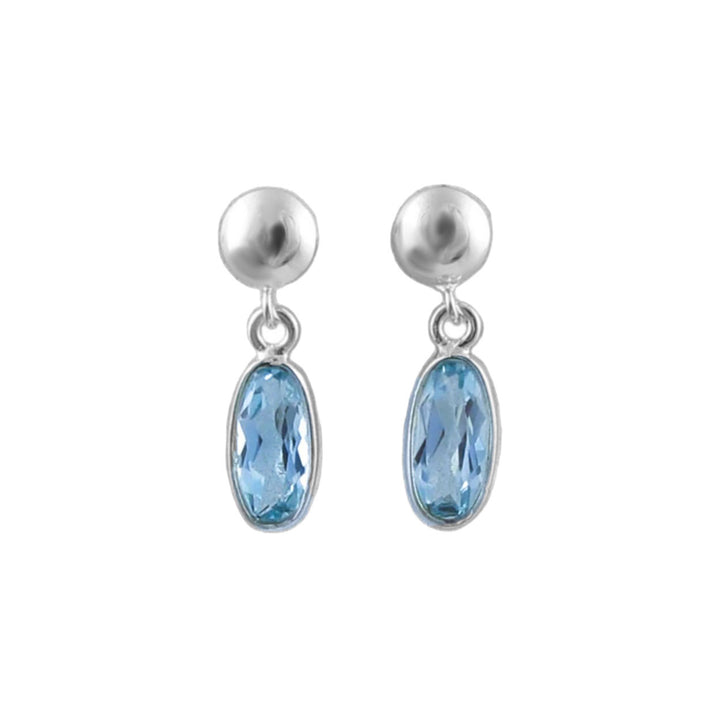 Long 925 silver drop earrings with blue topaz gemstones on a white background