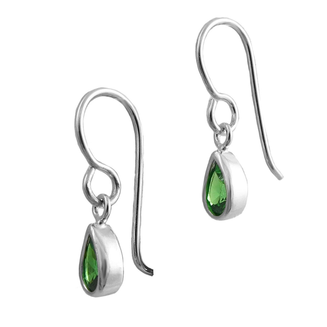 A pair of silver drop earrings with teardrop-shaped emerald green CZ  gemstones, shown against a plain white background.