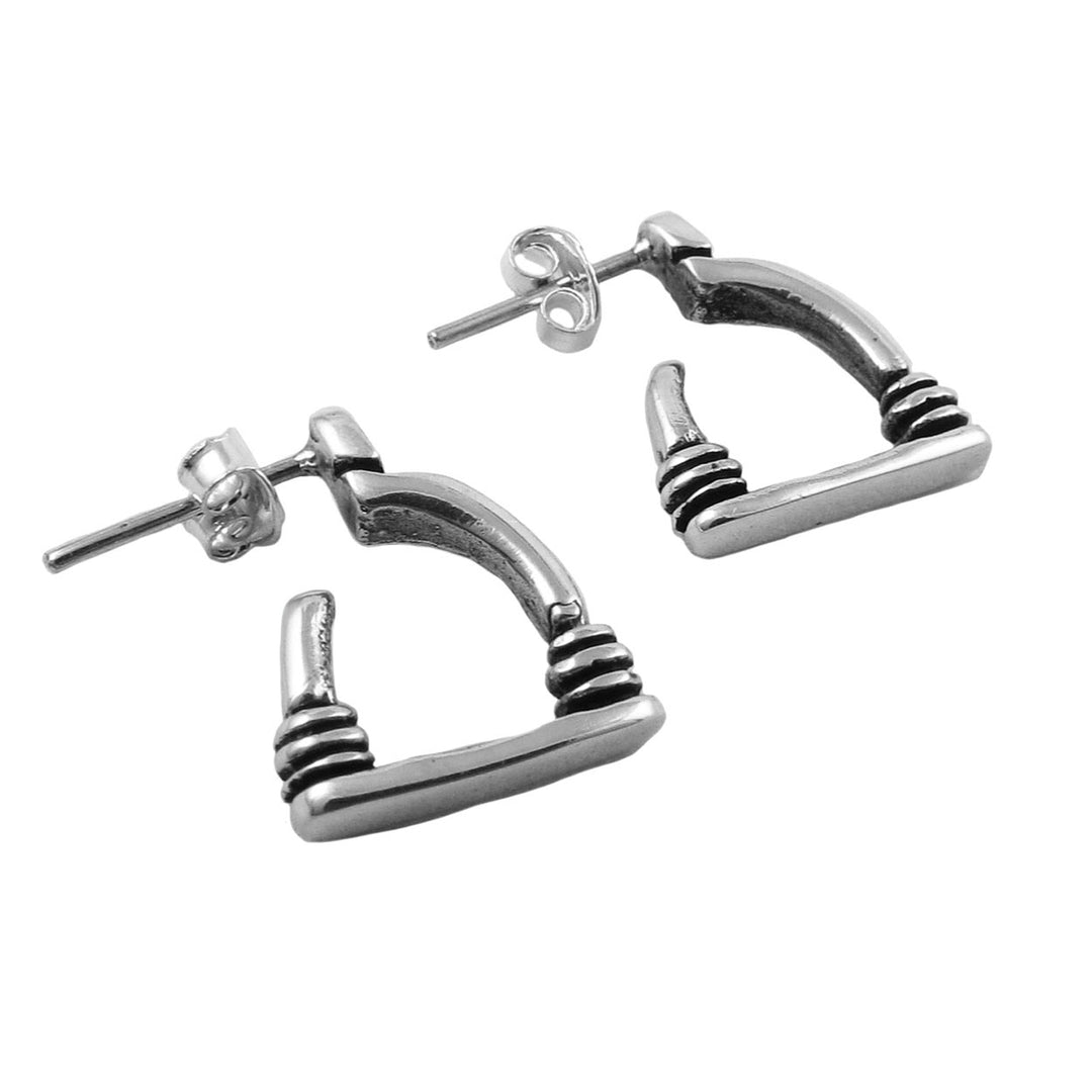 A pair of solid 925 sterling silver geometric hoop earrings shaped like horse stirrups with textured spiral details on the bottom, shown on a plain white background.