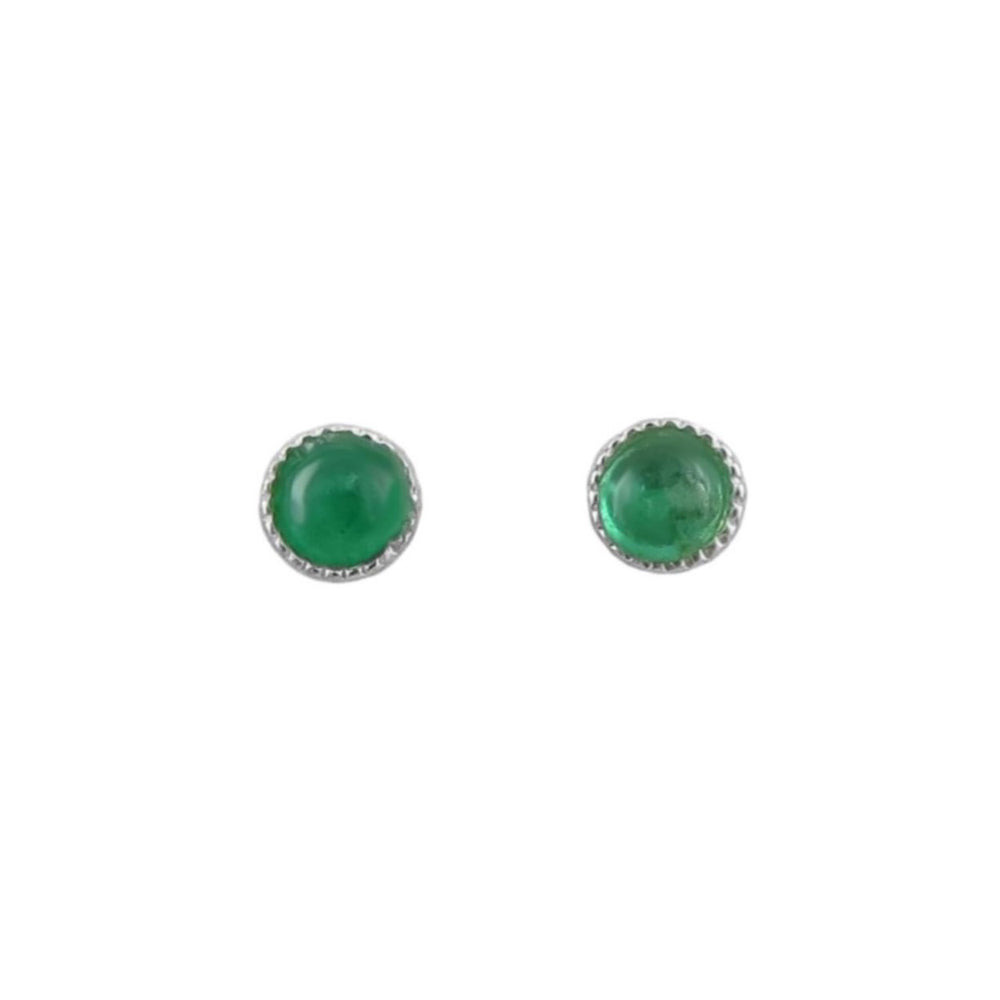 A pair of round stud earrings featuring green natural emerald cabochon gemstones in silver bezel settings with a scalloped edge, shown on a plain white background.