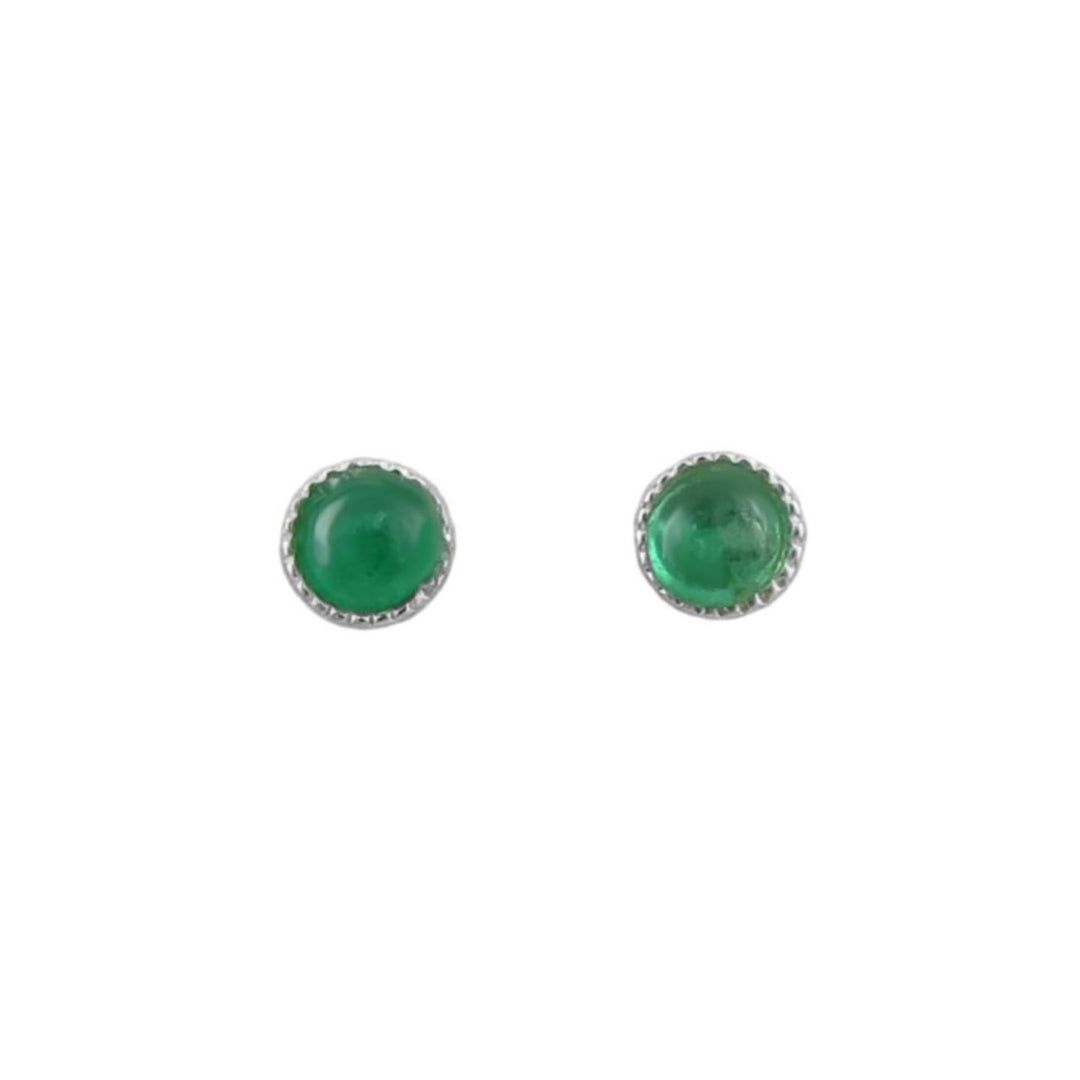 A pair of round stud earrings featuring green natural emerald cabochon gemstones in silver bezel settings with a scalloped edge, shown on a plain white background.