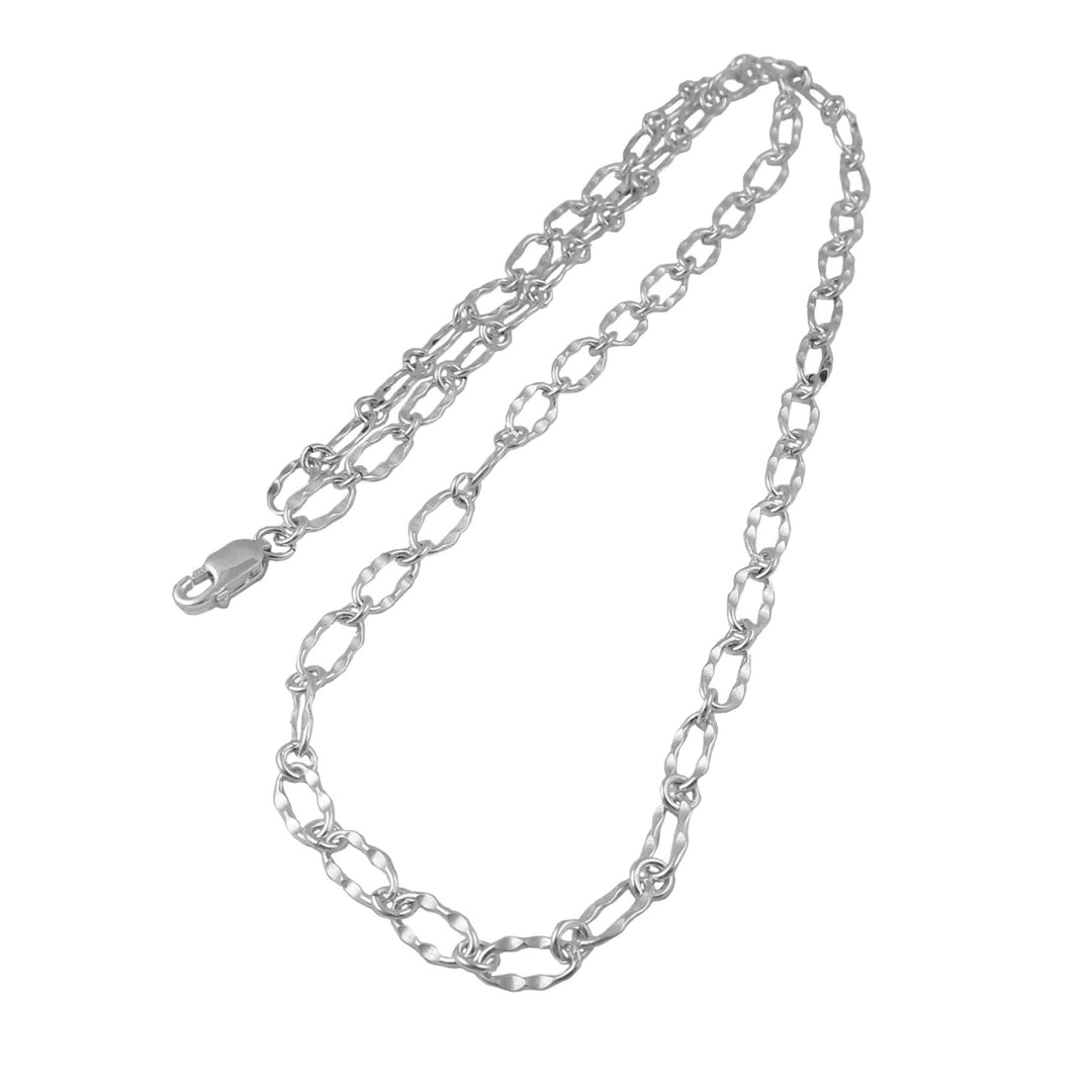 Silver chain necklace on a white background