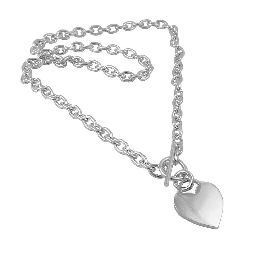 Silver chain necklace with a heart-shaped pendant on a white background