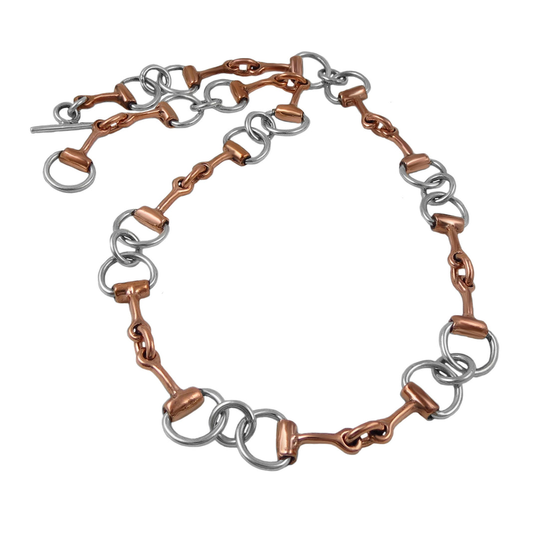 Copper and silver chain necklace on a white background