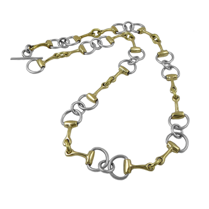 Necklace with gold and silver links on a white background