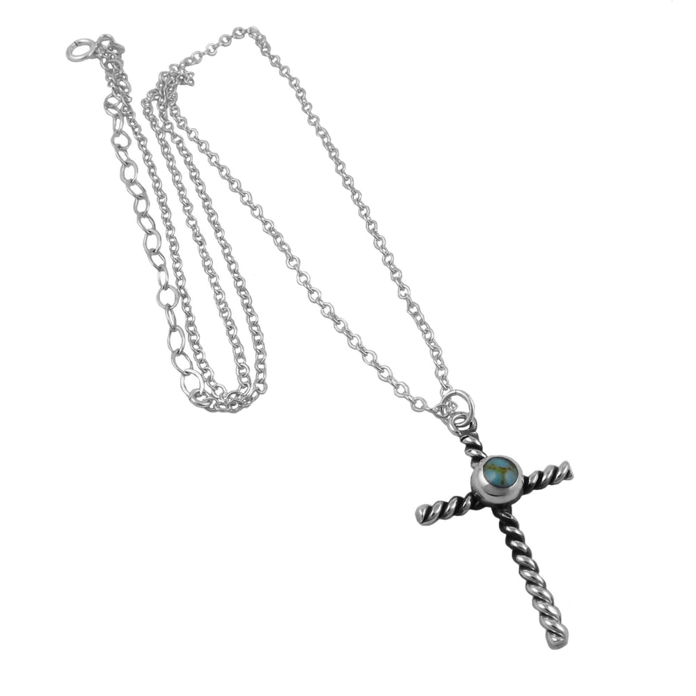 Silver cross necklace with a turquoise coloured bead  on a white background