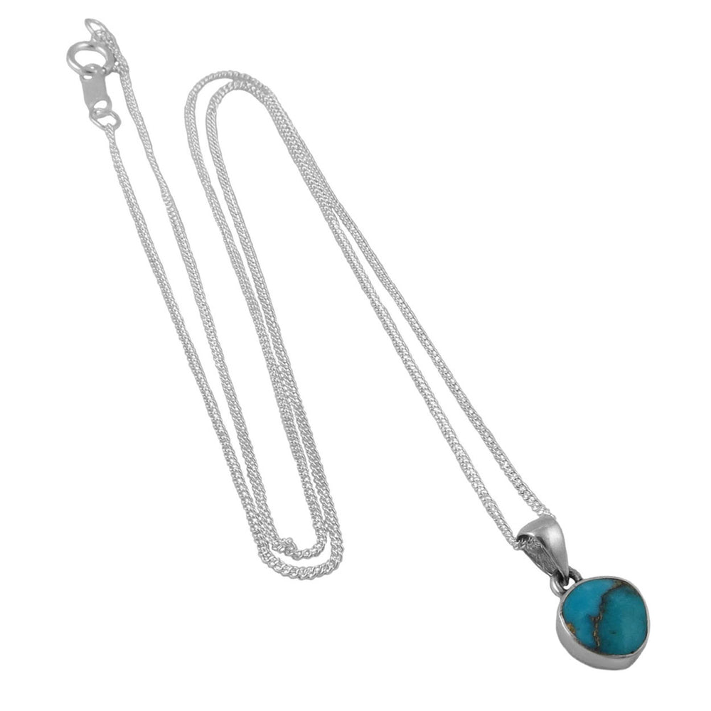 Silver necklace with a turquoise pendant on a white background