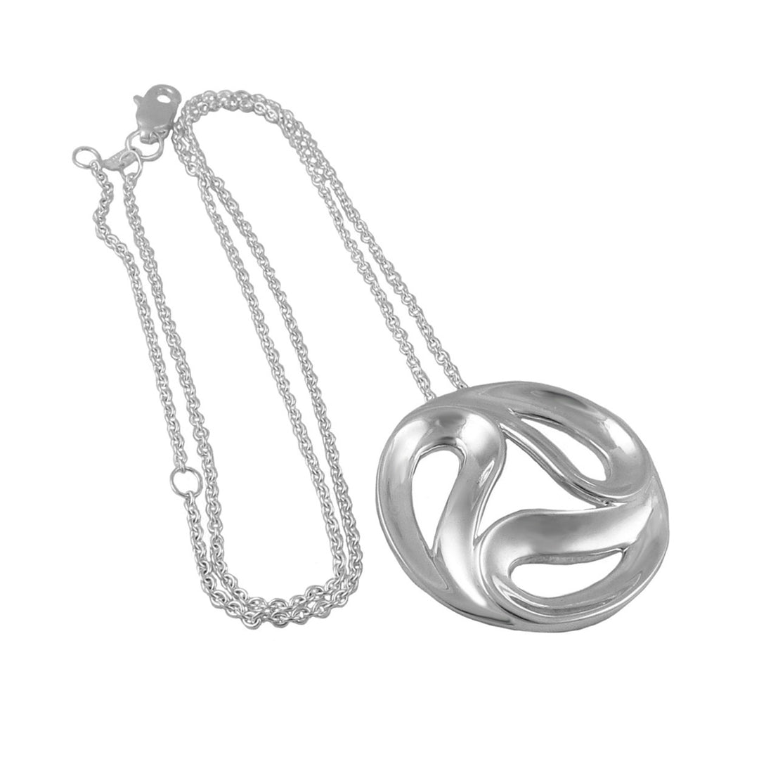 UK hallmarked sterling 925 Silver necklace with a large, intricate yin and yang design pendant on a white background