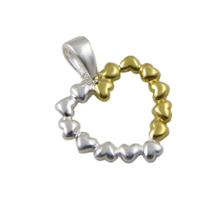 Two-tone 925 silver and yellow gold heart-shaped pendant on a white background
