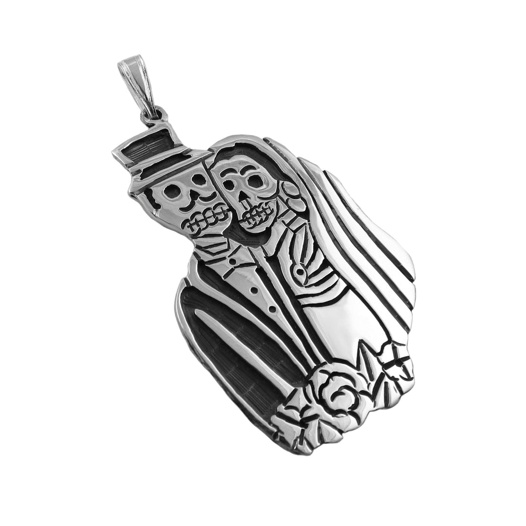 Large sterling 925 Silver pendant with day of the dead bride and groom skeleton design on a white background