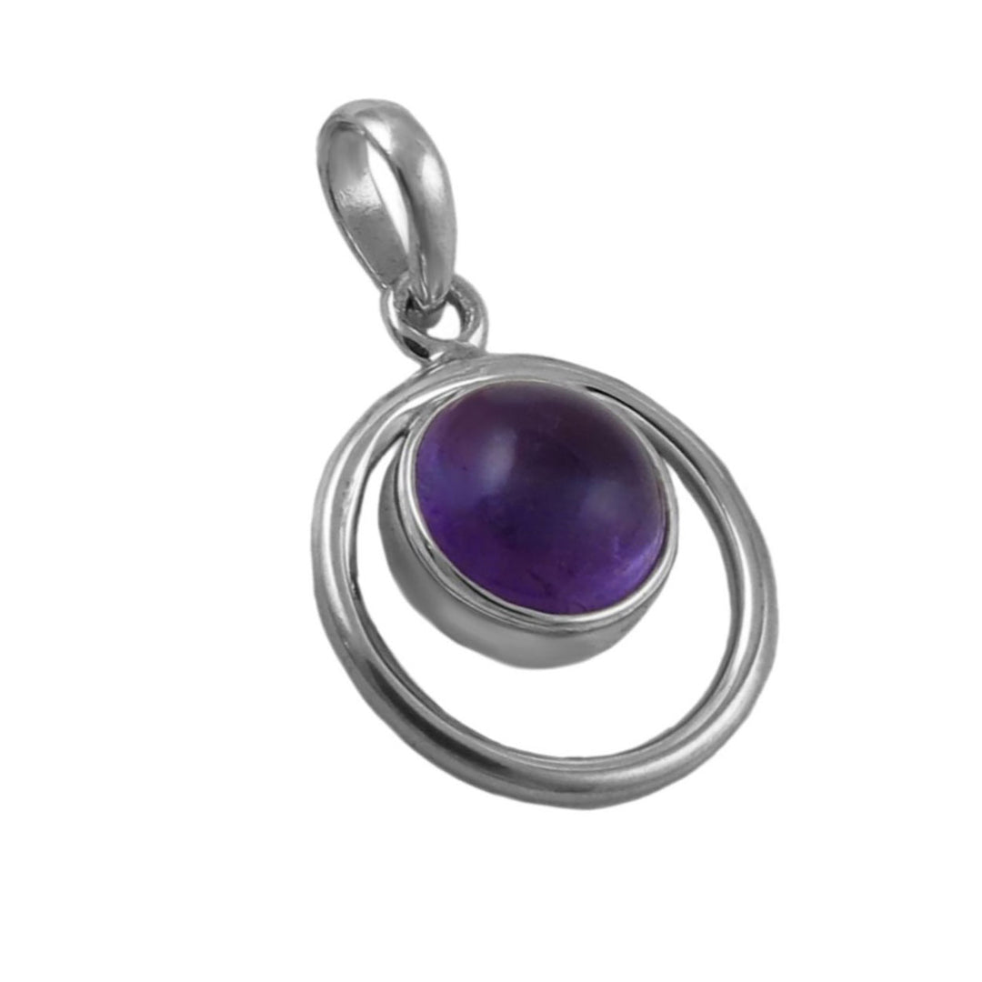 A large sterling silver circle pendant jewellery with a bezel set purple amethyst gemstone on a white background. 