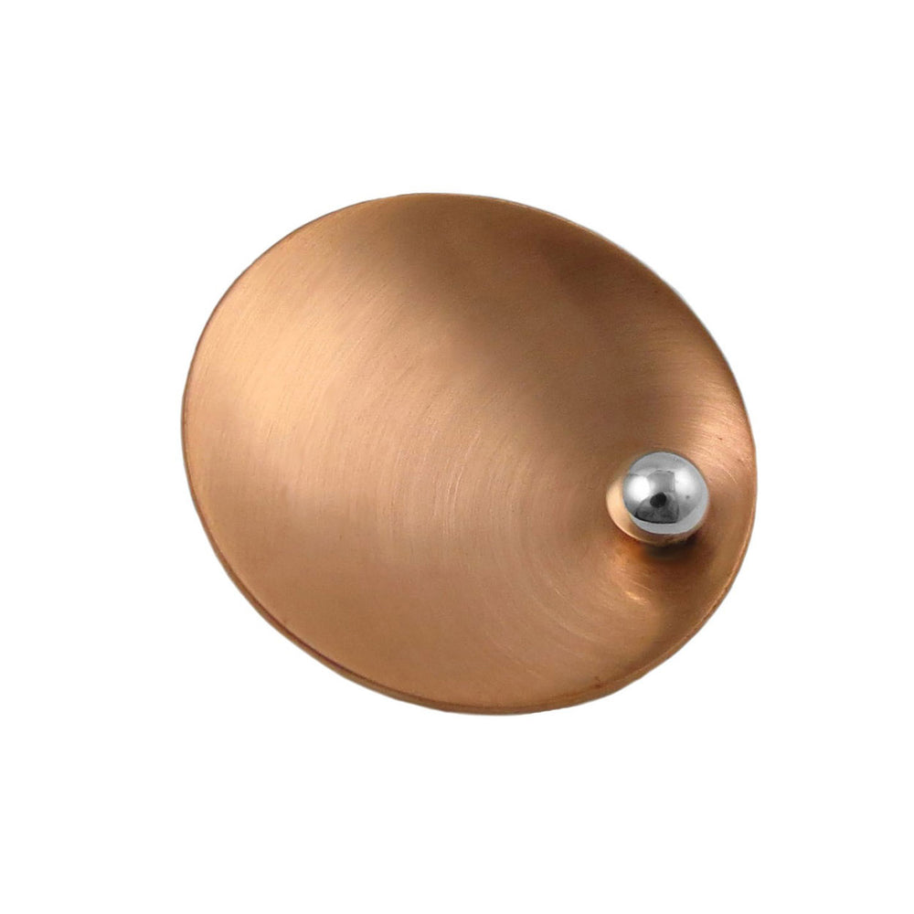 A large brushed copper and 925 silver pendant jewellery on a white background