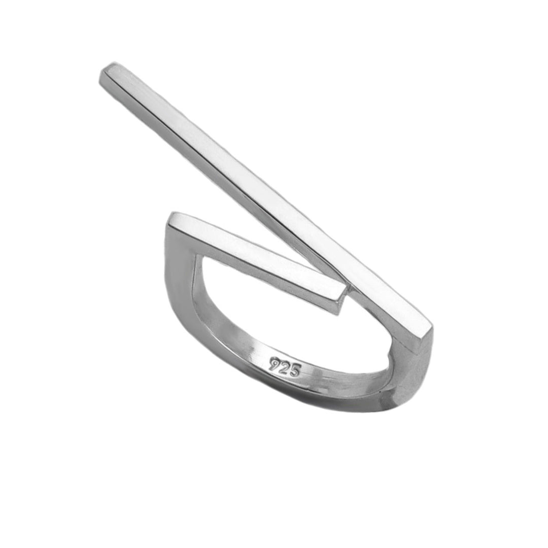 Silver ring with a unique modern stick design on a white background