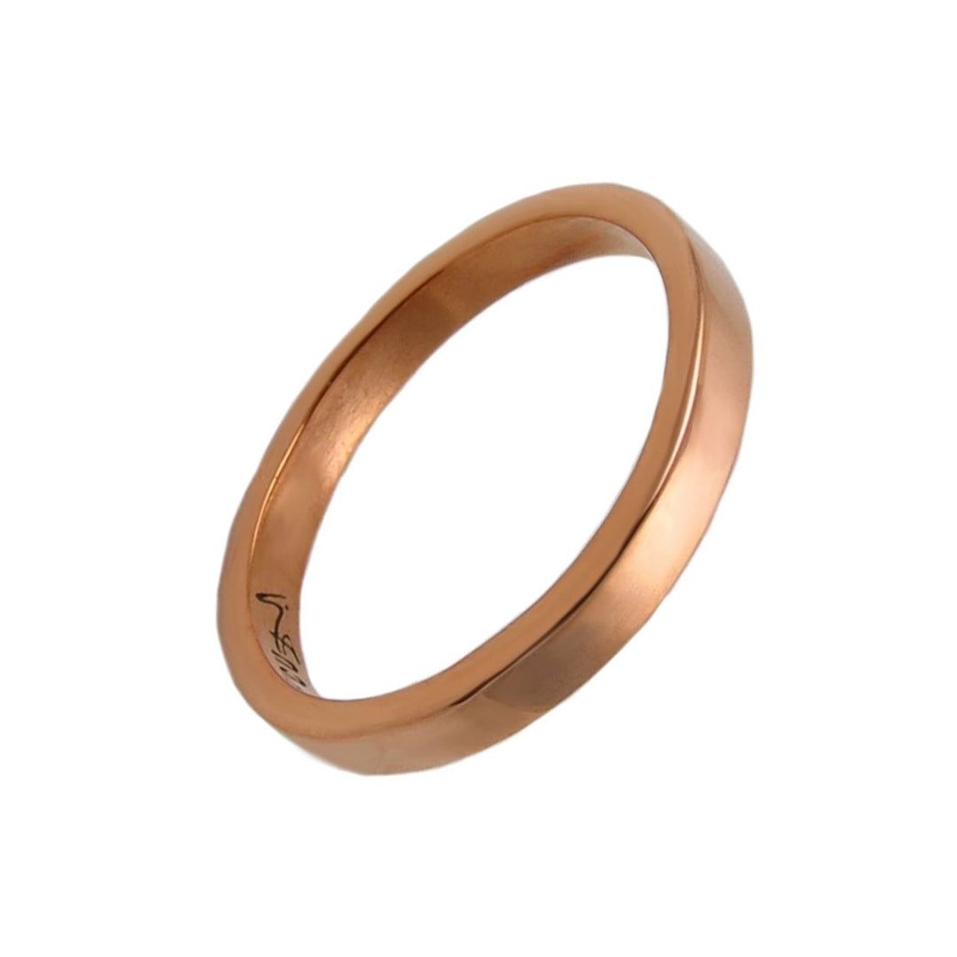 Solid polished copper ring jewellery for women on a white background