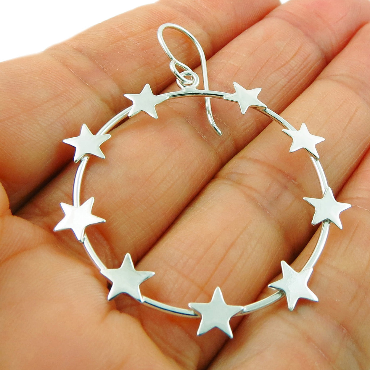 Sterling silver star hoop on sale earrings