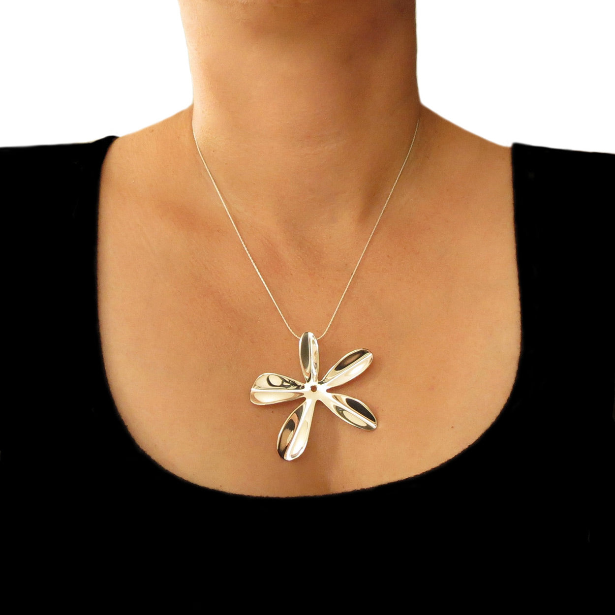 Silver flower pendant on sale necklace