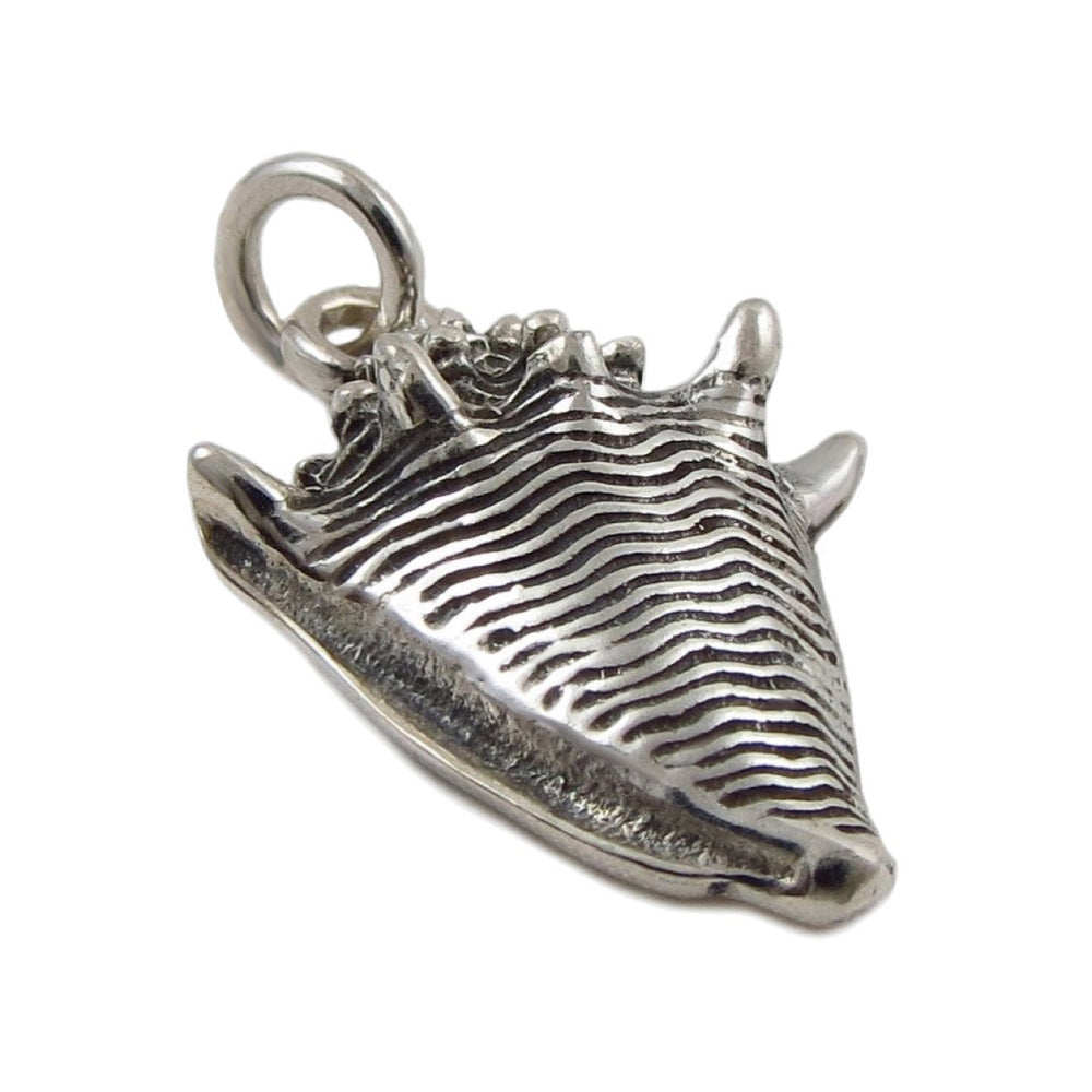A silver pendant in the shape of a conch shell with a polished and blackened antiqued finish, featuring a hollow centre and a circular bale.