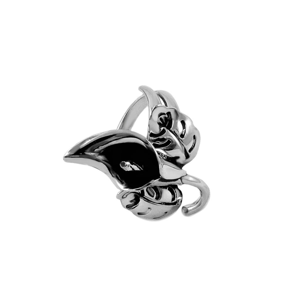 A large sterling 925 Mexican silver calla lily flower ring with an adjustable spiral shank on a white background. 